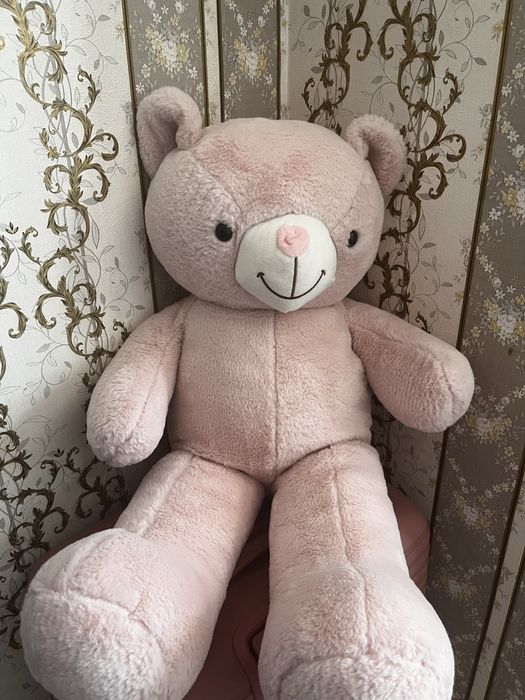 Милый плюшевый медвежонок