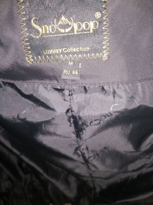 Продам пуховик женский.