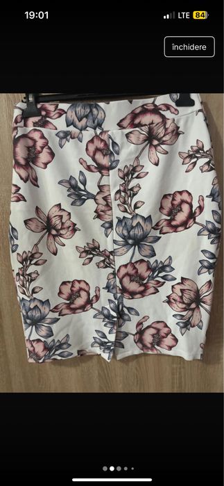 Fusta dama, in stare buna, cu flori, a fost modificata