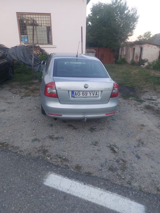 Vand Skoda octavia 2011 o (schimb cu logan pe gaz)