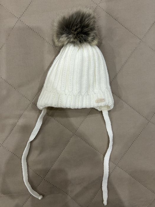 Зимние шапки для новорожденных