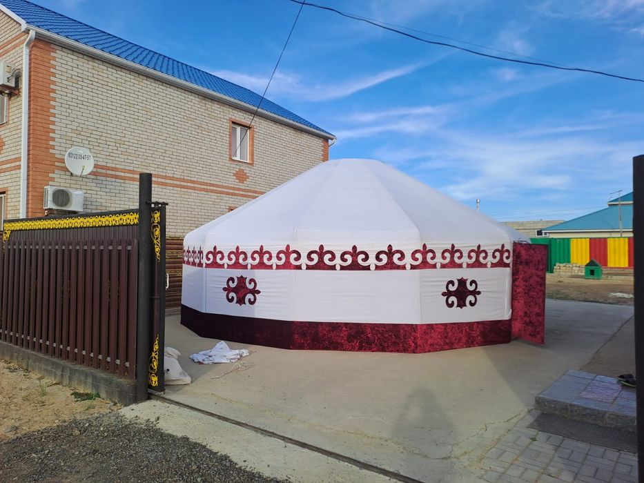 Киіз уй посудасымен