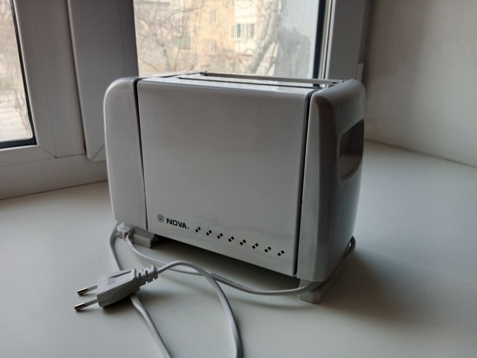 Продам тостерницу NOVA RX 2219C новая