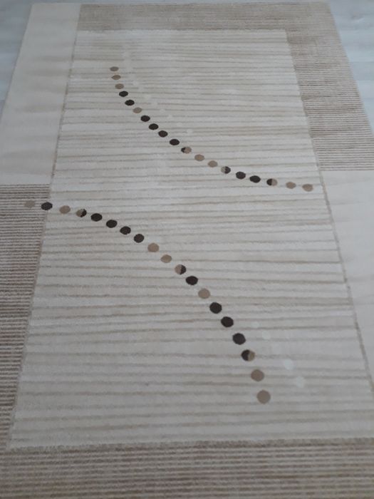 Шерстяной натуральный ковер продается