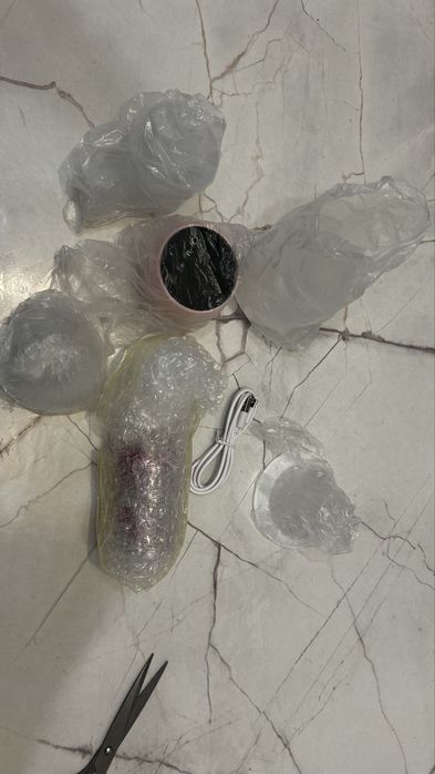 Молокоотсос (электрическая)