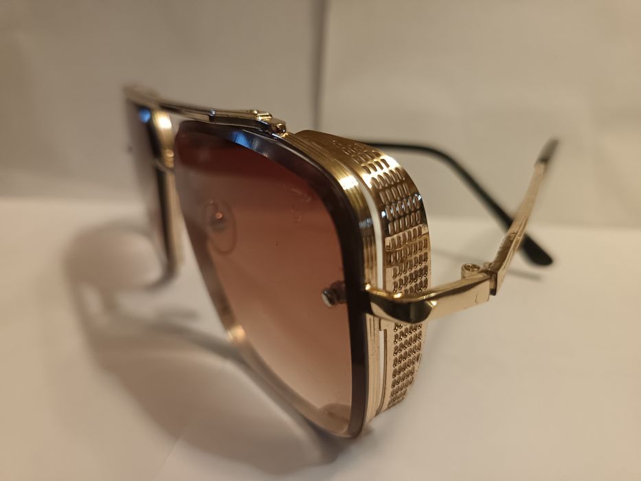 Дизайнерски слънчеви очила