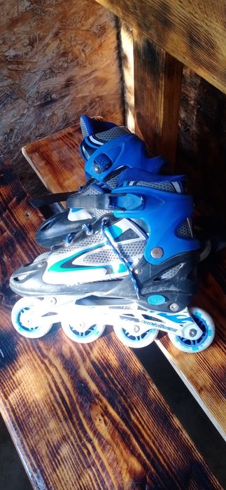 Раздвижные роликовые коньки