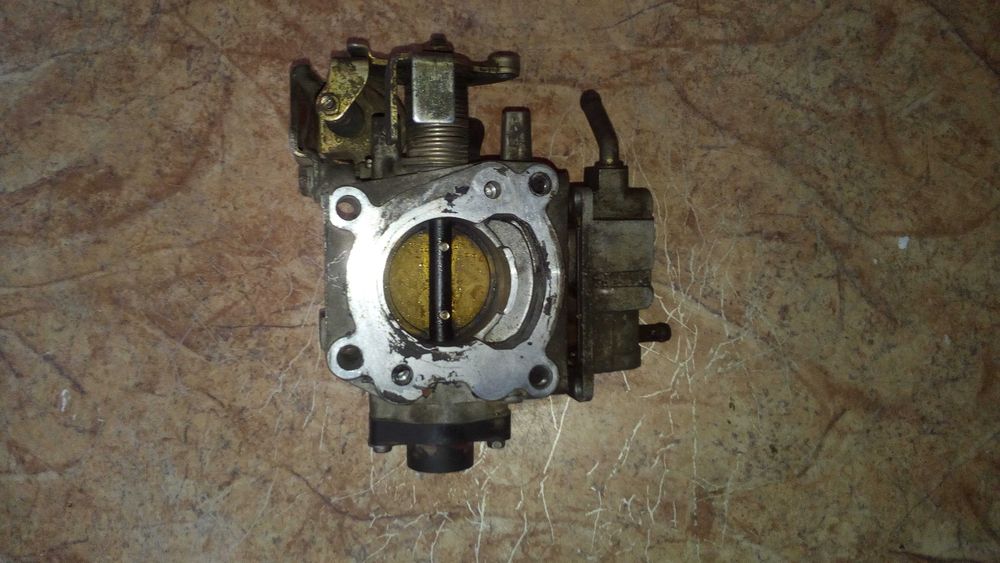 Дроссельная заслонка