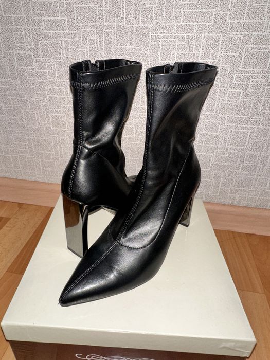 черный ботельион с кзким носом