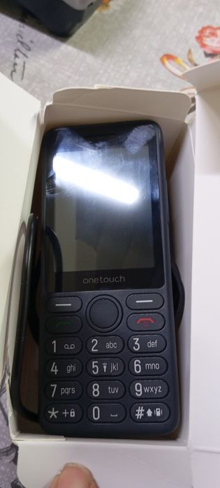 Telefon cu butoane tcl 312d
