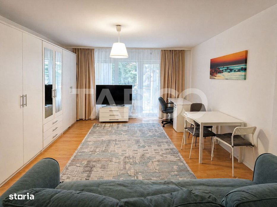 Garsoniera de vanzare 47 mp utili cu o mica gradina de 17 mp