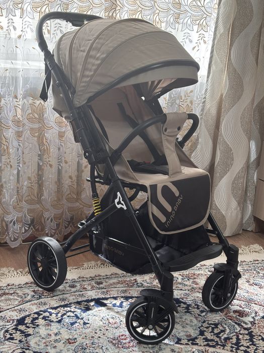 Продам детскую прогулочную коляску Ining baby