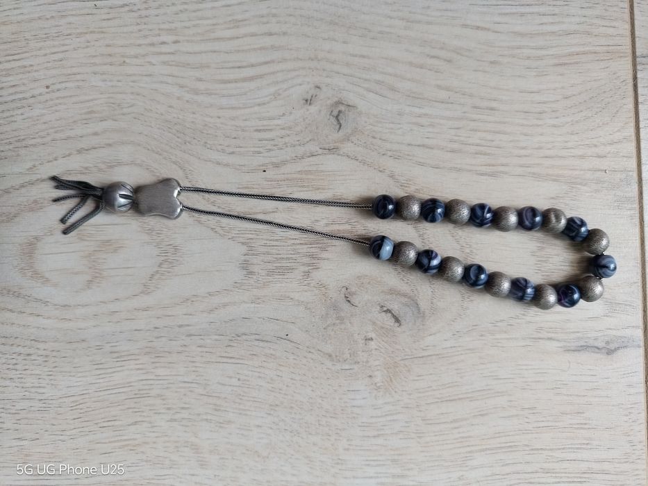 Старинна сребърна броеница