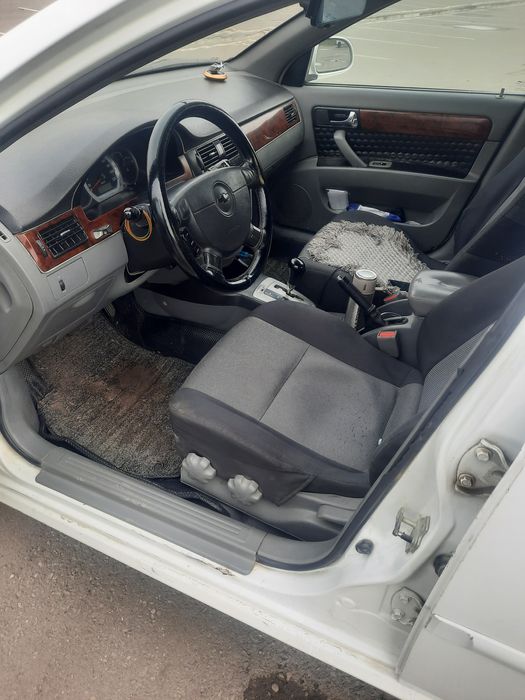 Лачетти 2013 автомат люк кондитсанер