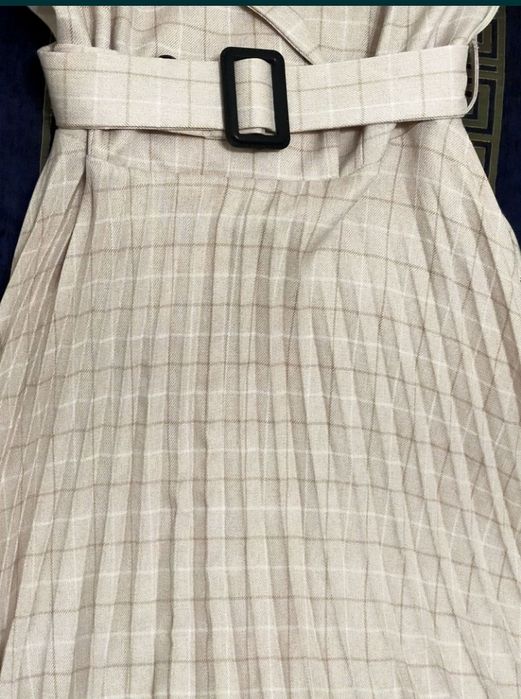 Женское платье плессе.