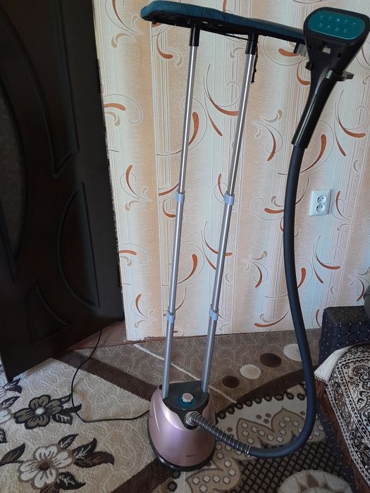 Паровой.       Утюг