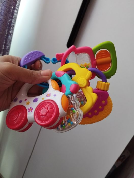 Игрушки погремушки для малышей