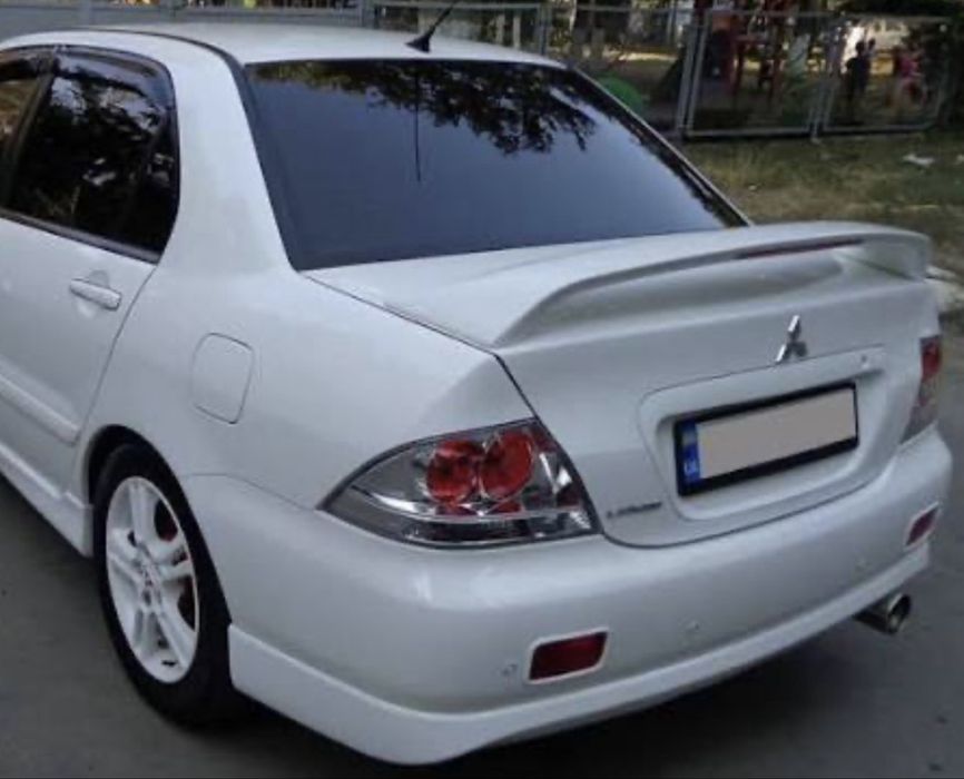 Продам накладки на лансер 9