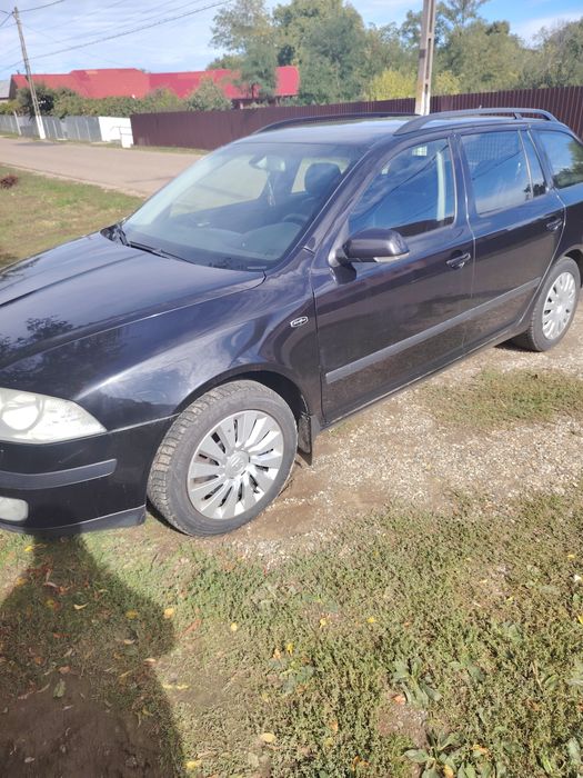 Vind scoda Octavia 2 lauriclement în stare foarte buna