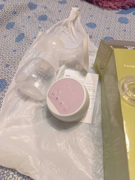 Электрический молокоотсос б/у