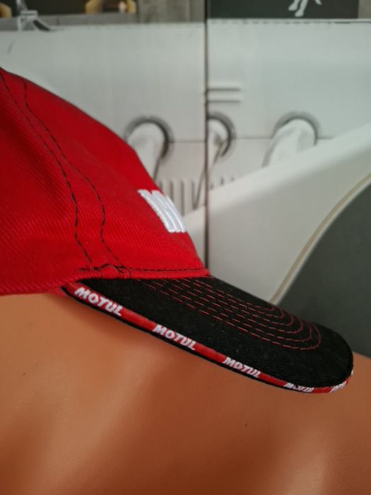 Șapcă      Motul
