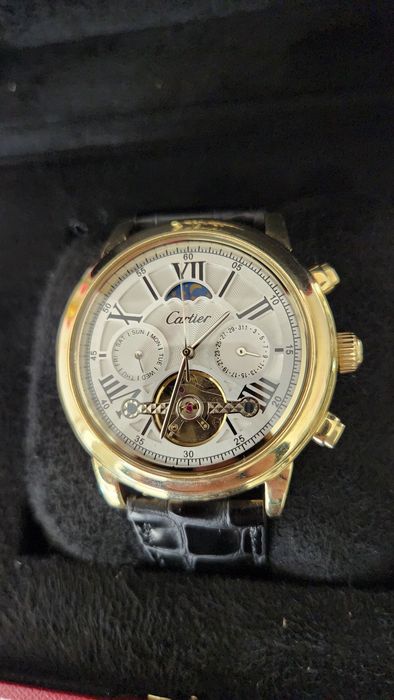 Мужские золотые часы Cartier