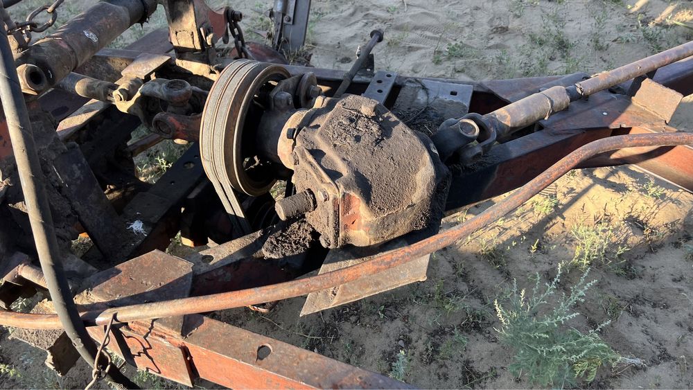 Косилка трехбрусная.