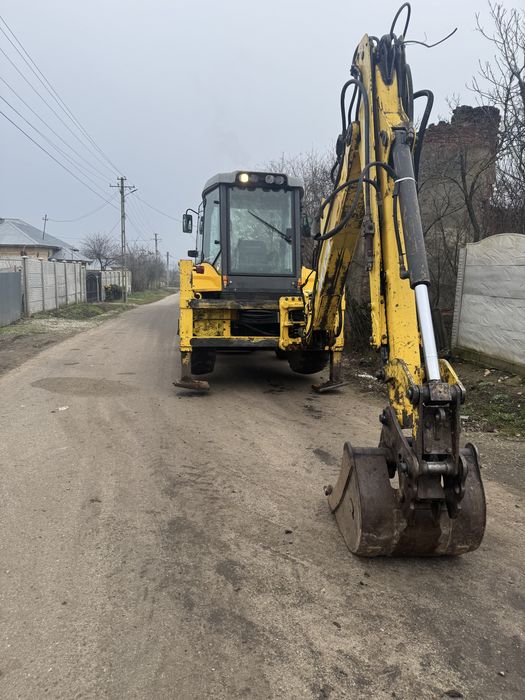 Buldoexcavator New Holland LB110