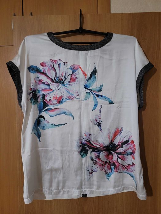 Продам одежду в состоянии нового.