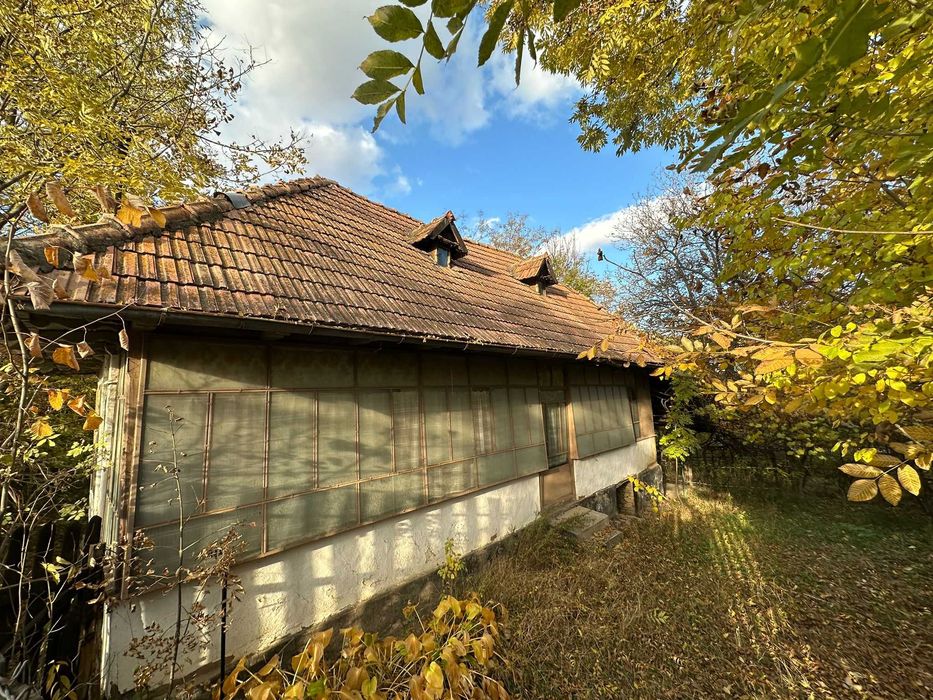 teren si casa in slanic