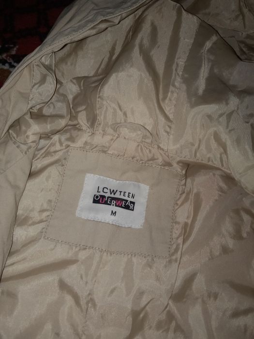 Продам зимний пуховик