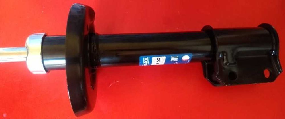 стойка амортизатора OPEL Corsa