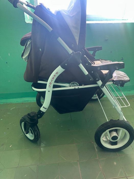 Колеска для близняшек