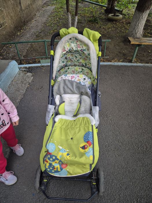 Продам зимнюю коляску-санки