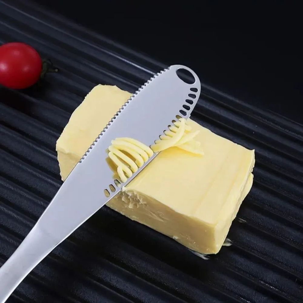 Кухонный нож с отверстиямм для масла и сыра.: 45 000 сум - Посуда .