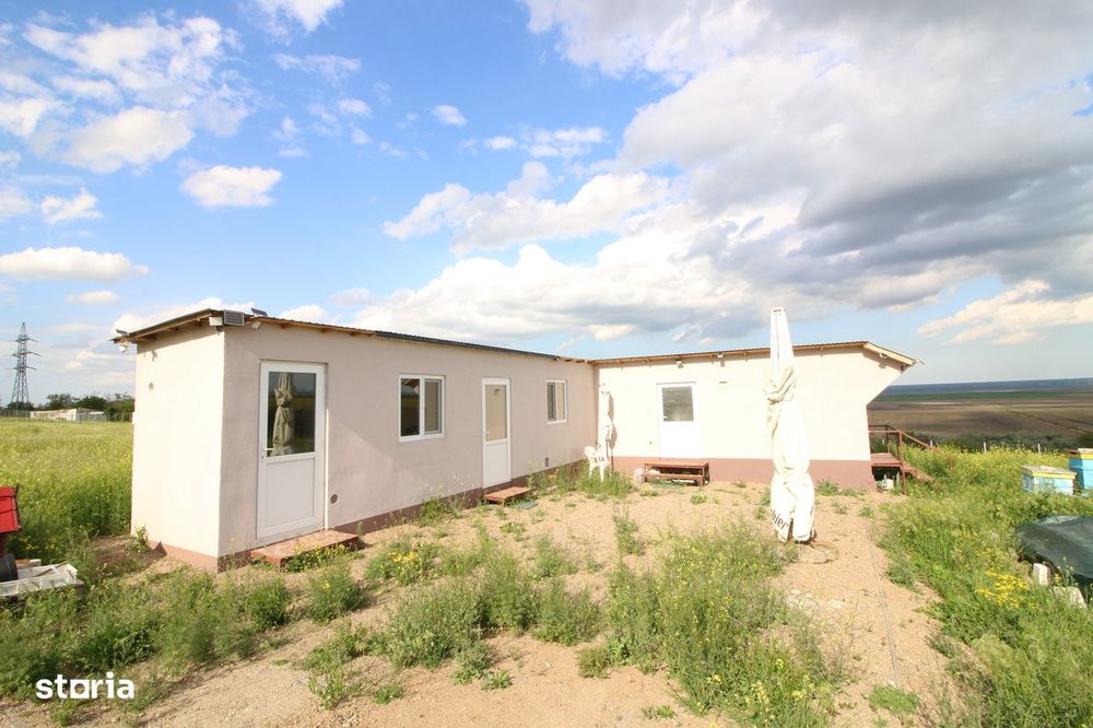 Vand 500mp teren + locuinta modulara 54 mp com.Vanatori