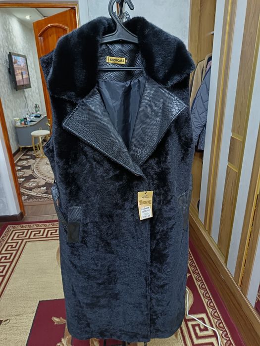 Жилетка стильная