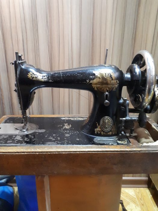 Швейная машинка Зингер