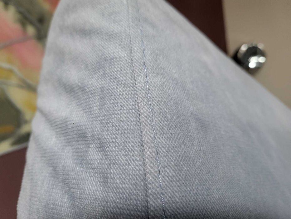 ПРОМОЦИЯ! Светло син ъглов диван от плат с функция сън и ракла