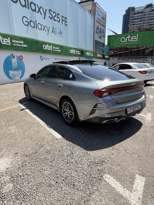 Kia K5 panarama mokriy