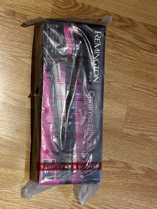 Placă de îndreptat părul Remington Ceramic Straight 230 C