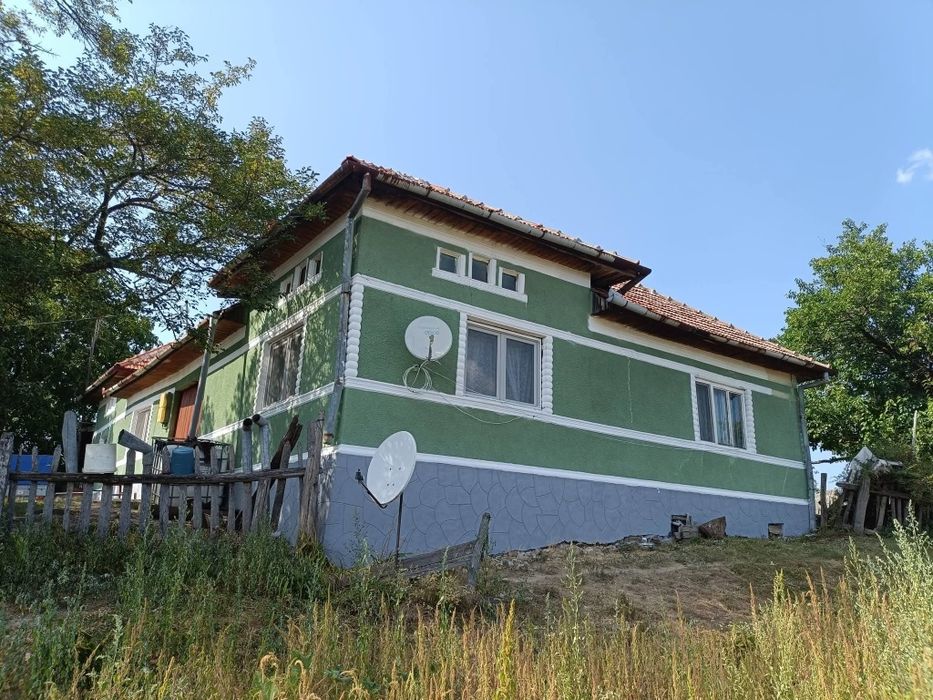 Casa și teren la munte