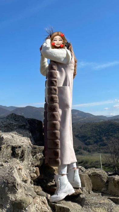 Тёплая жилетка женская