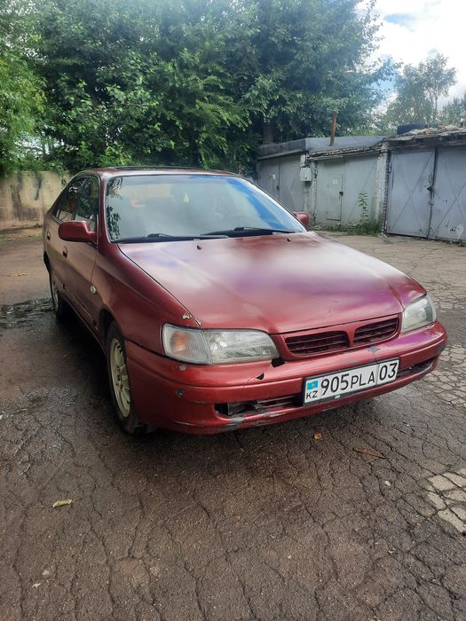 Продам тойота карина е