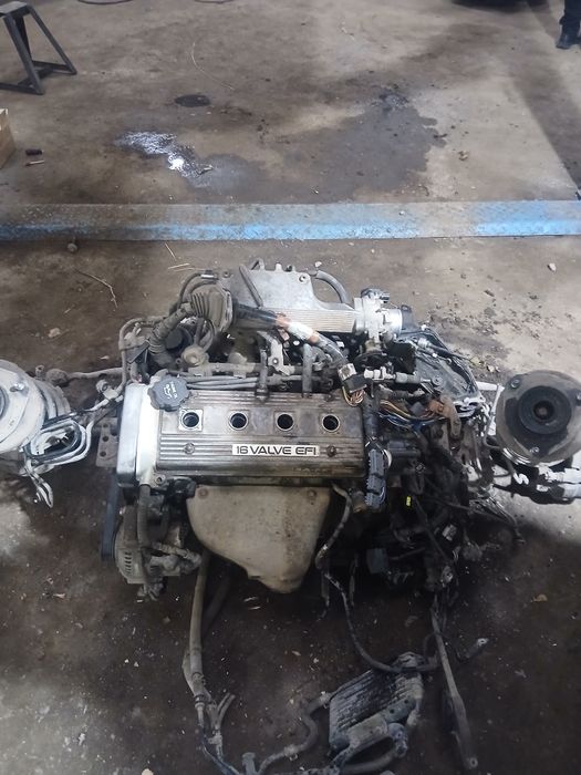 Запчасти Тойота Карина Е