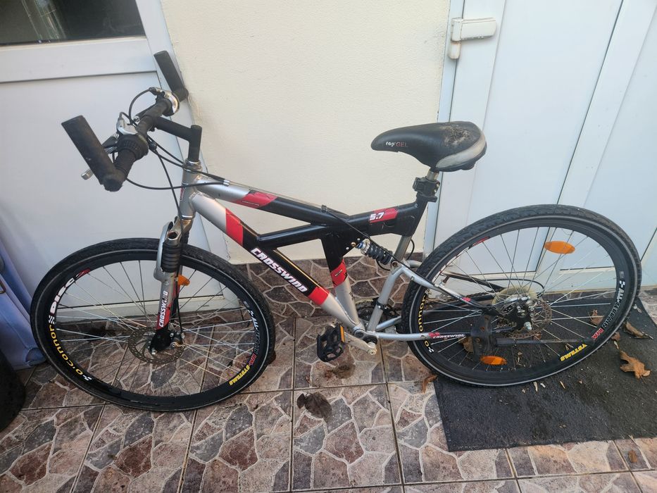 Bicicleta aluminiu , cercuri duble frane pe disc necesare revizie