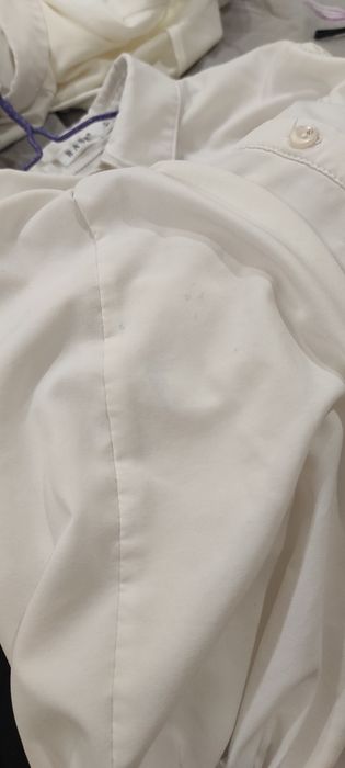 Белая женская блузка