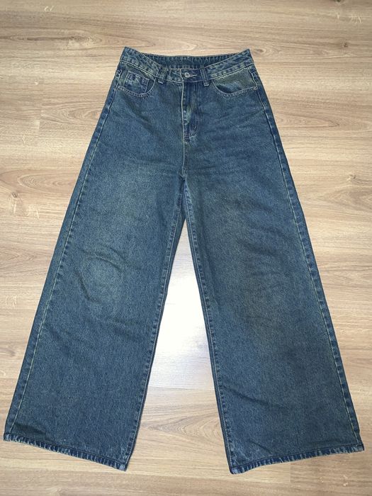 Джинсы обтертые