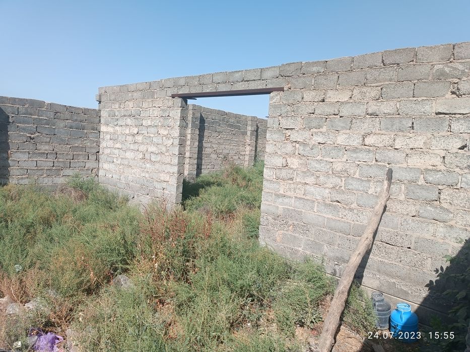 Тайлок туман Богизогон марказида битказилмаган бино сотилади