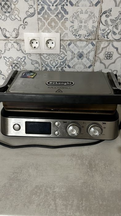 Гриль DeLonghi 1030D